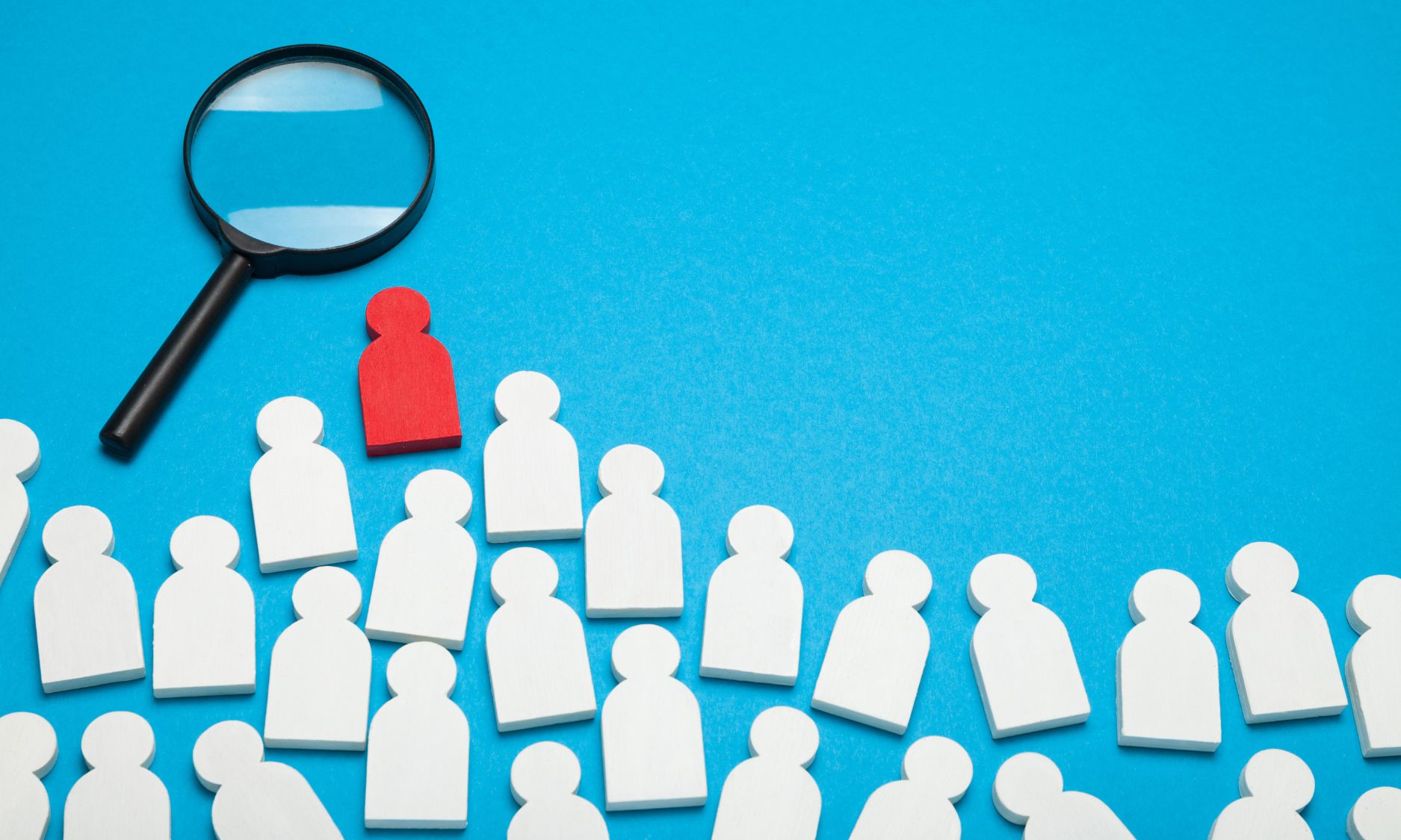 Magnifying Glass With Stick Figures Showing Talent Acquisition