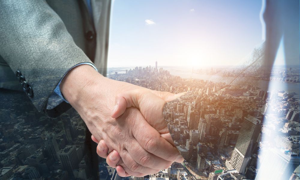 Men Shaking Hands With Landscape Background