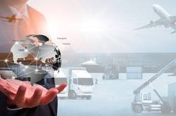 Business Man Holding globe With Vehicles In Background