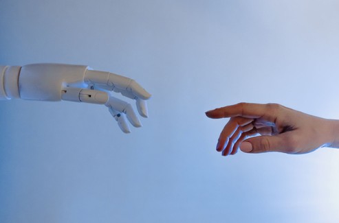 AI Robot Hand And Human Hand