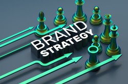 Green Chess Pieces With &quot;Brand Strategy&quot; Written Between Them