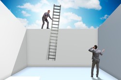 Man Holding Ladder Down To Other Man