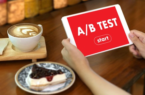 Person Doing A/B Test On Tablet