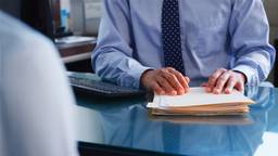 Company documents being reviewed for a UAE business bank account application.